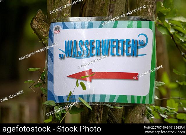 07 July 2022, Lower Saxony, Osnabrück: ""Water Worlds"" is written on a sign at Osnabrück Zoo. The zoo opens the new ""Water Worlds"" facility on 5