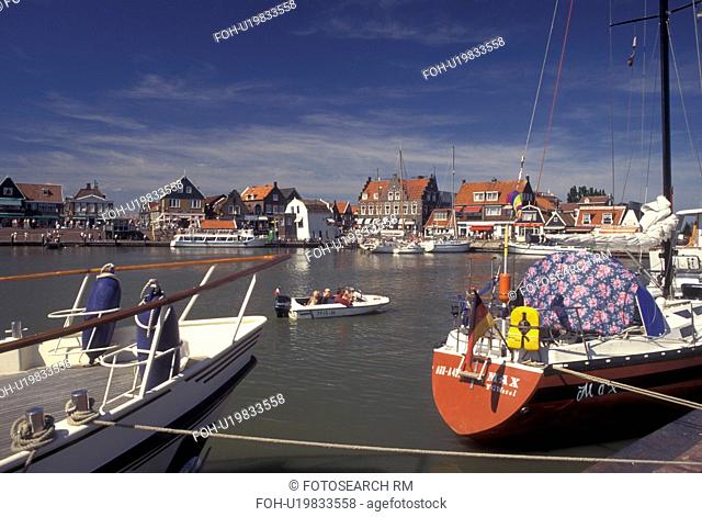Netherlands, Holland, Volendam, Noord-Holland, Europe, Boats docked in the harbor on Markermeer in the town of Volendam
