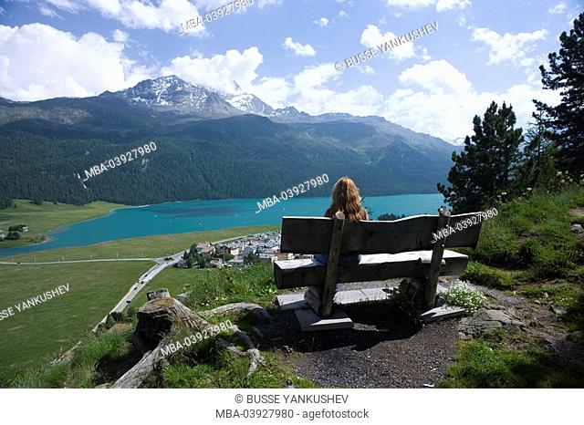Switzerland, Graubünden, Engadin, Silvaplana-Lake, Silvaplana, woman, bench