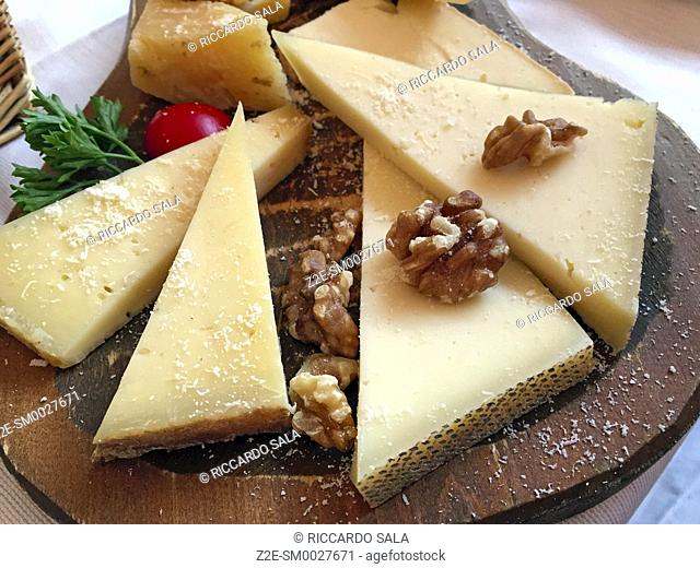 Italy, Lombardy, Tirano, Cheese Platter with Walnuts