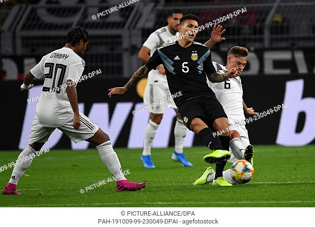 09 October 2019, North Rhine-Westphalia, Dortmund: Soccer: International matches, Germany - Argentina in Signal Iduna Park: Joshua Kimmich (r9 from Germany...