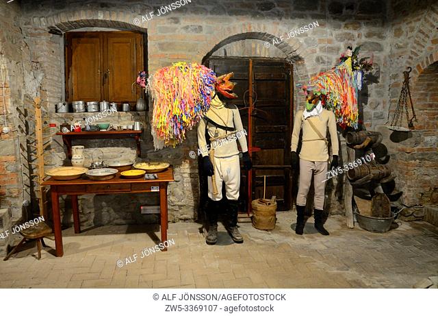 Interior in Aliano museum with figures wearing cultural masks in Aliano, Basilicata; Italy
