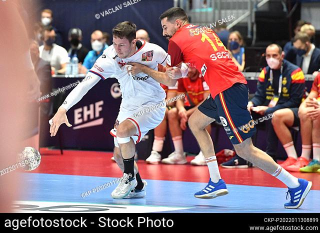 Vojtech Patzel of Czech Republic, left, and Ferran Sole Sala of Spain in action during the European Men's Handball Championship match Spain vs Czech Republic in...
