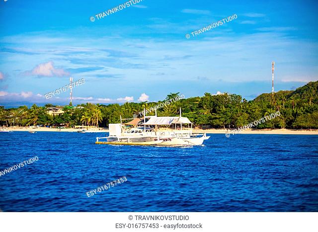 Big catamaran in the open sea near Bohol island