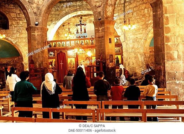 Syria - Damascus - Izra'. Church of St. George, 515 AD. Interior, celebration of Mass