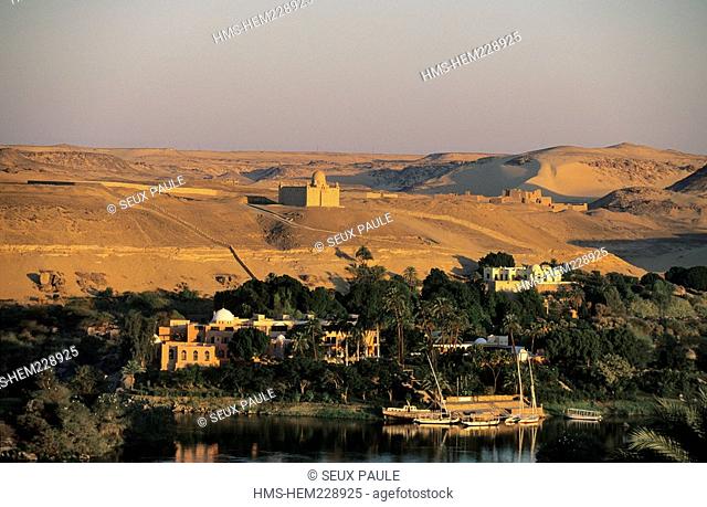 Egypt, Upper Egypt, Aswan, Nile River and Aga Khan Mausoleum on hilltop