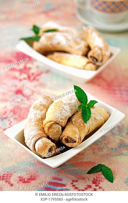 Puff pastry rolls with chocolate and walnuts