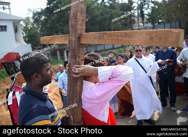 Christian devotees take part in the re-enactment of the crucifixion of Jesus Christ and his death at Calvary on Good Friday at Agartala