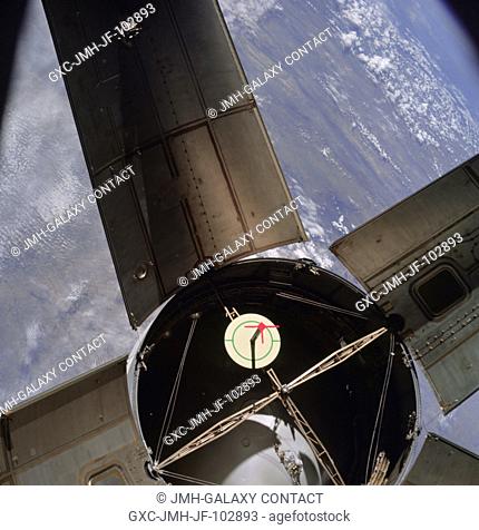 The expended Saturn IVB stage as photographed from the Apollo 7 spacecraft during transposition and docking maneuvers at an altitude of 126 nautical miles
