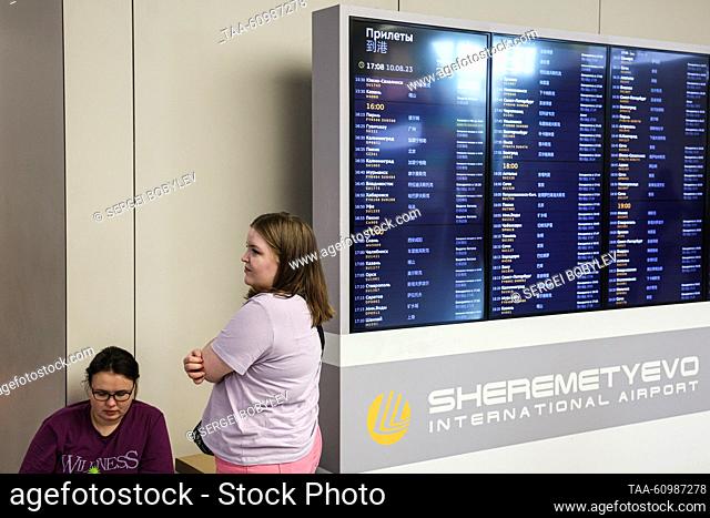 RUSSIA, MOSCOW REGION - AUGUST 10, 2023: Seen in this image is a bilingual arrivals information board at the Sheremetyevo International Airport after Russia and...