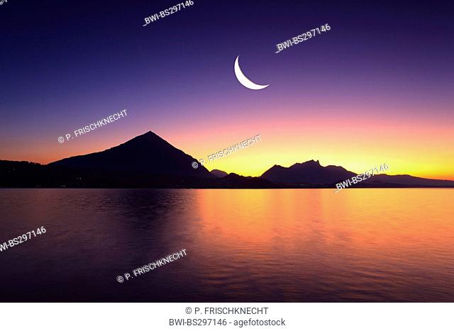 view over Lake Thun at the Niesen (2362 m) with last quarter of the moon, Switzerland, Berne, Bernese Oberland