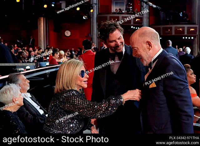 Gloria Campano, Bradley Cooper and Oscar® nominee J.K. Simmons during the 94th Oscars® at the Dolby Theatre at Ovation Hollywood in Los Angeles, CA, on Sunday