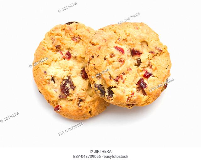 Sweet cookies with raisins isolated on white background