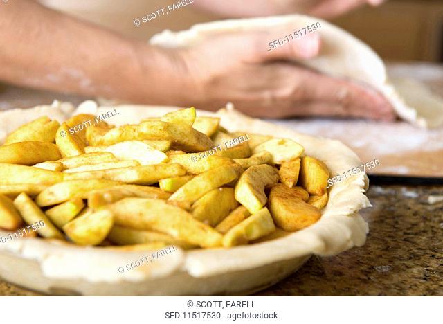 Apple pie being made