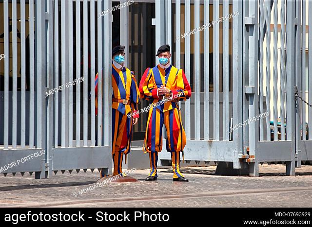Angelus. The Pontifical Swiss Guards on duty at the Arco delle Campane wear masks to protect themselves from the coronavirus