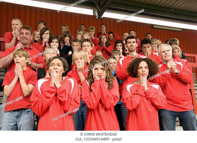 Group of nervous football supporters
