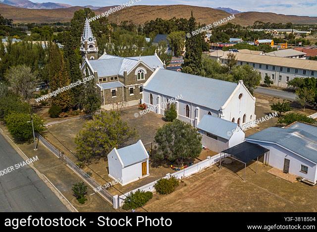 Aerial view of the small Karoo town of Laignsberg with the N1 highway passing through. In the foreground is the regional Dutch Reformed Church (NGK) with the...
