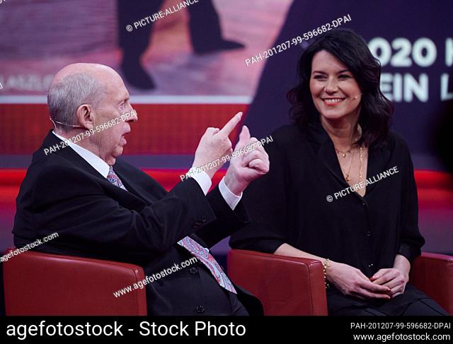 06 December 2020, North Rhine-Westphalia, Duesseldorf: The football manager Reiner Calmund (l) and Ms Sylvia (r) are sitting in the studio for the RTL annual...