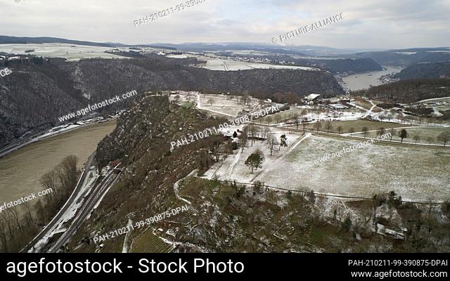 09 February 2021, Rhineland-Palatinate, St. Goarshausen: Snow lies on the Loreley rock plateau on the Rhine (photo taken by drone)