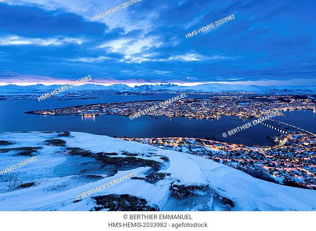 Norway, Lapland, Troms, Tromso, the city at dusk from Mount Storsteinen