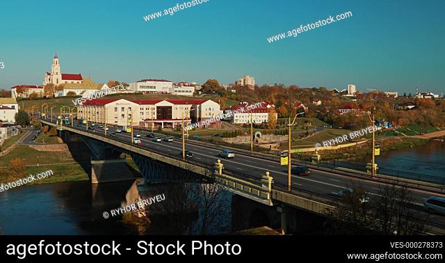 Grodno, Belarus. Grodno Regional Drama Theater And Catholic Church Of Discovery Of Holy Cross And Bernardine Monastery In Sunny Autumn Day