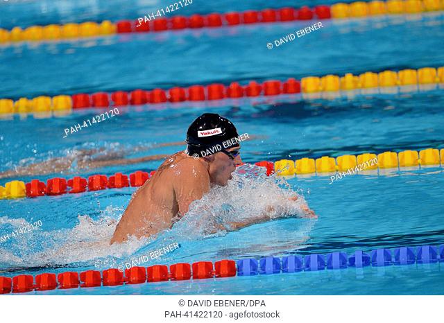 Ryan Lochte of the USA comepets in the men's 200m Individual Medley semifinal during the 15th FINA Swimming World Championships at Palau Sant Jordi Arena in...
