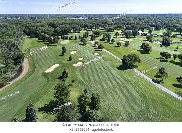 Aerial view of a suburban Chicago golf course with fairways and sand traps in Wilmette, IL. USA