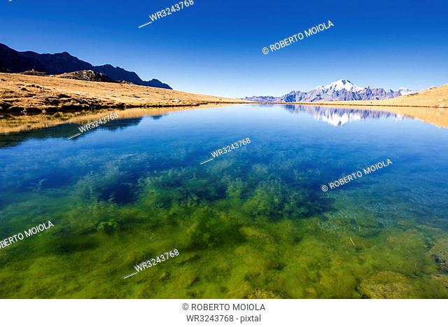 Clear water of lakes of Campagneda with Monte Disgrazia in background, Valmalenco, Valtellina, Sondrio province, Lombardy, Italy, Europe