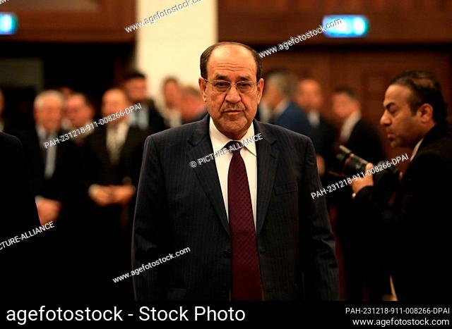 18 December 2023, Iraq, Baghdad: Former Iraqi Prime Minister Nouri al-Maliki arrives at a polling station to cast his vote in the first provincial council...