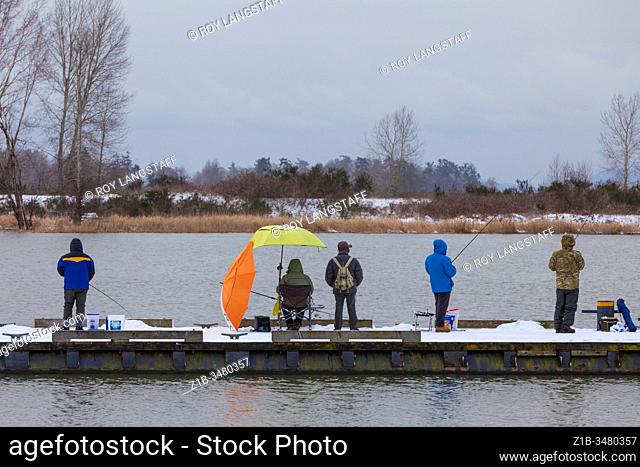 Fishermen along the Steveston waterfront on a cold winter day in British Columbia