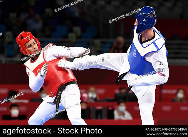 27 July 2021, Japan, Chiba: Taekwondo: Olympia, preliminary bout, round of 16, men +80 Kg, at Makuhari Messe Hall. Vladislav Larin (r