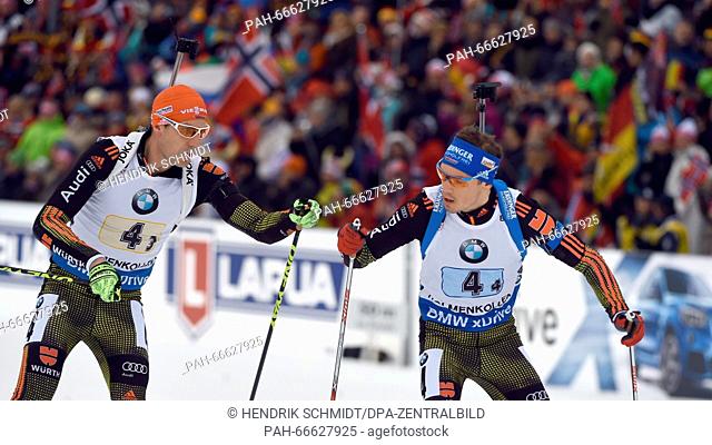 Arnd Peiffer (L) and Simon Schempp of Germany in action during the Men's 4x7.5 km relay competition at the Biathlon World Championships