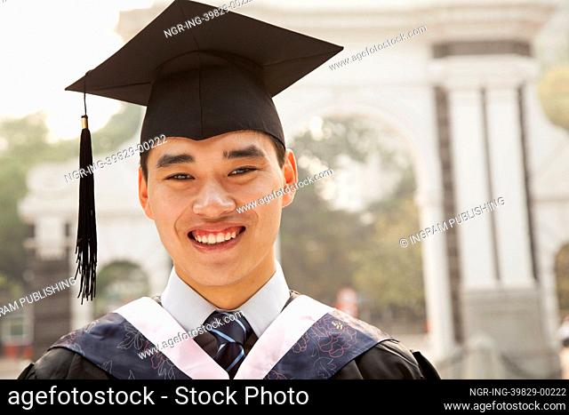 Young Graduate in Cap and Gown