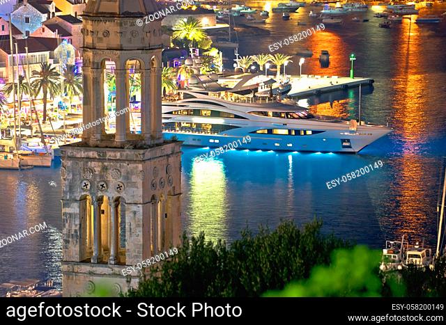 Hvar bay and yachting harbor aerial evening view, island in Dalmatia archipelago of Croatia