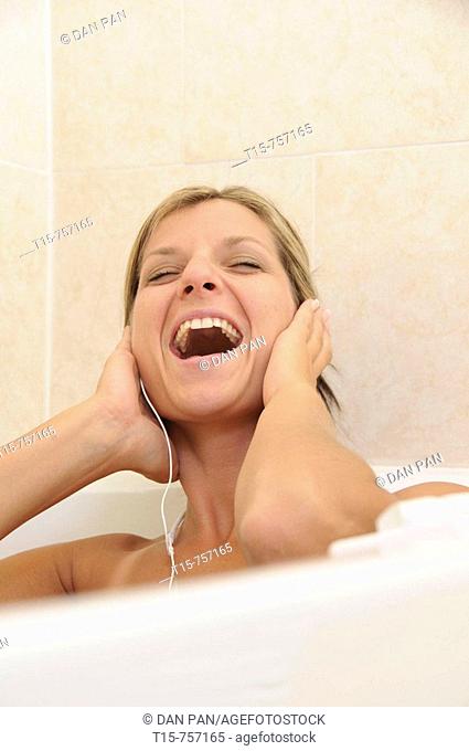 woman singing in bath