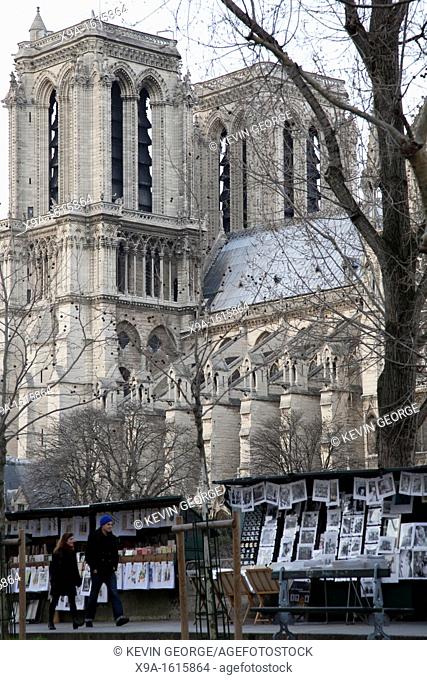 Notre Dame Cathedral with Book Stalls on the Banks of the River Seine in Paris, France