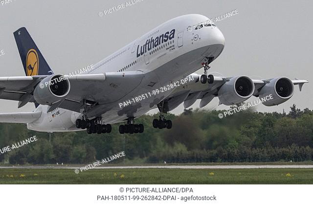 02 May 2018, Germany, Frankfurt am Main: An Airbus A-380 of Lufthansa starts on the western runway of Frankfurt am Main's airport