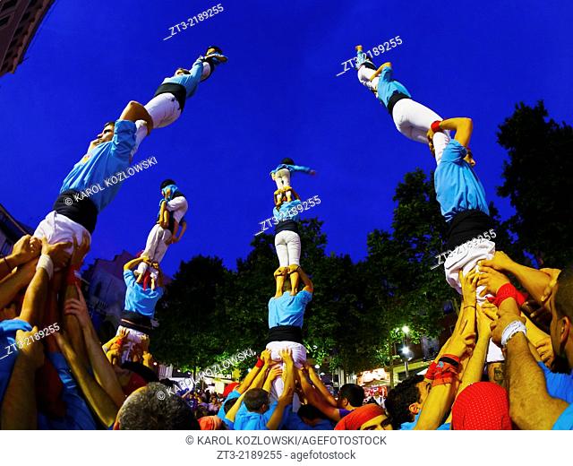 Castells Performance during the Festa Mayor 2013 in Terrassa, Catalonia, Spain. A castell is a human tower built traditionally in festivals at many locations...