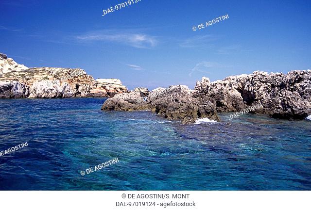 Coloured rocks, island of Cretaccio, Gargano National Park, Tremiti Islands, Apulia, Italy