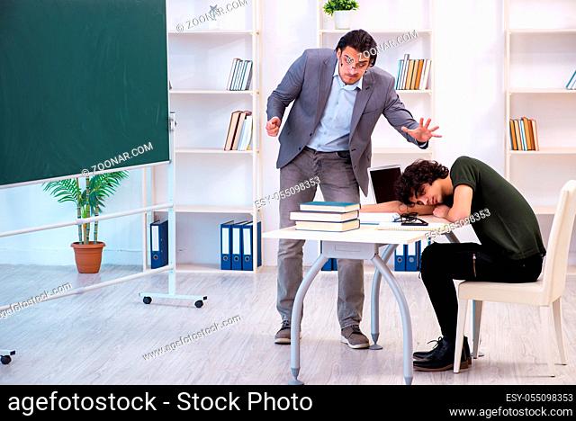 Young teacher and student in the classroom