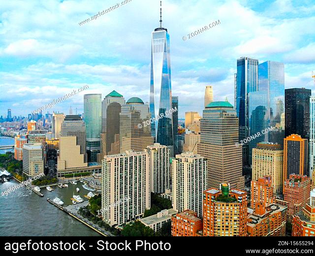 Aerial view of Manhattan Skyline, with World Trade Center, New York, USA. Panoramic skyline with skyscrapers and financial district and Hudson river, New York
