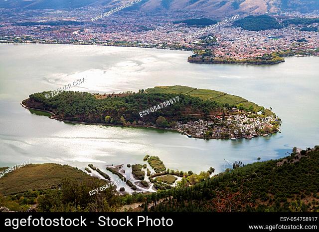 Beautiful panoramic view of Ioannina lake from Ligkiades mountain village with the lake island in the foreround and Ioannina city in the background