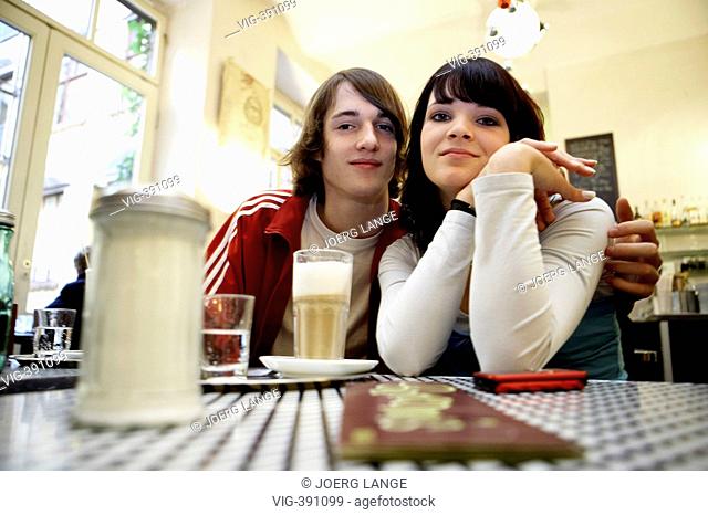 A young couple is sitting in a caffeehouse in Berlin. - Berlin, GERMANY, 02/12/2006