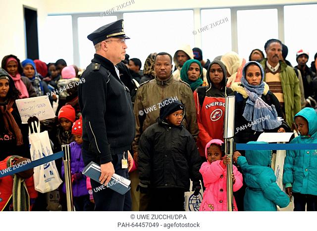 Refugees form Eritrea and Ethiopia arrive at Kassel Airport in Calden, Germany, 14 December 2015. A group of 156 so-called resettlement refugees from Khartoum