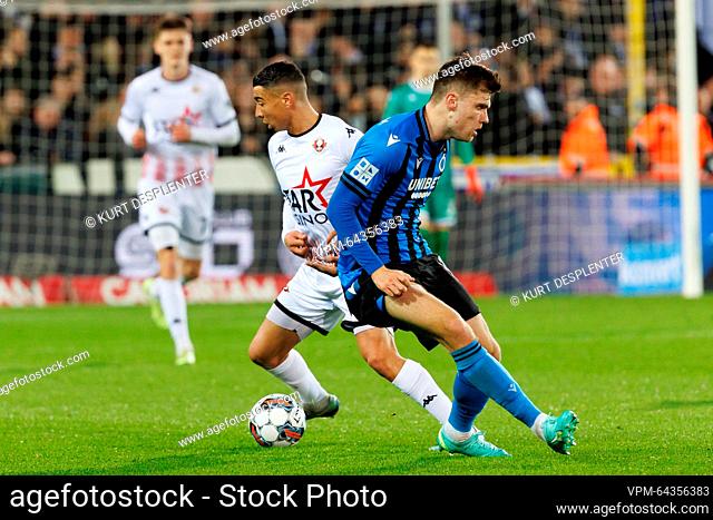 Club's Andreas Skov Olsen and Seraing's Sami Lahssaini fight for the ball during a soccer match between Club Brugge KV and RFC Seraing