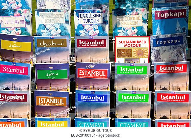 Travel guide books for sale outside a shop