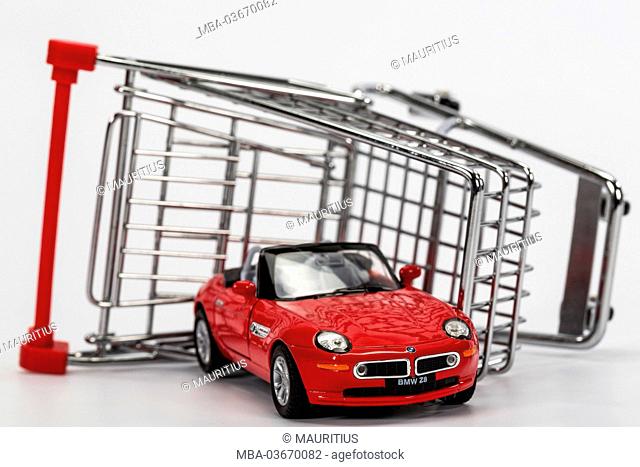 Shopping trolley, overturned, model car, BMW Z8, symbol, car purchase