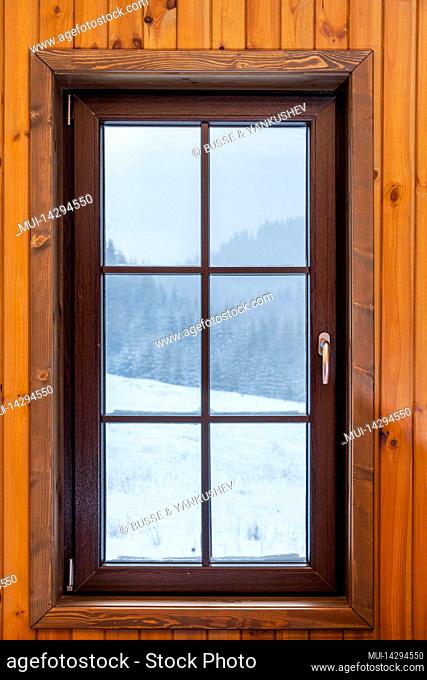 Window with view outside in snowy landscape