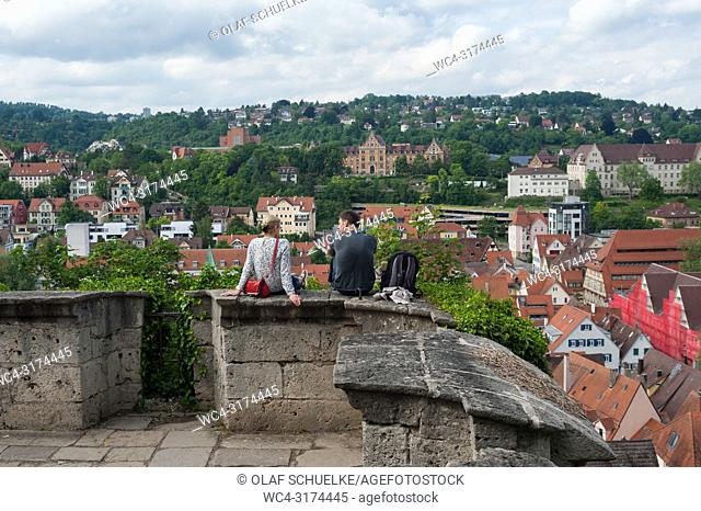 05. 06. 2017, Tuebingen, Baden-Wuerttemberg, Germany, Europe - A man and a woman enjoy the view from the Castle Hohentuebingen over Tuebingen's old town