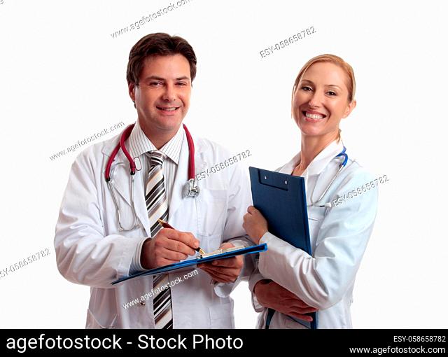 Smiling healthcare professionals holding folders of patient or medical information. Focus to male doctor
